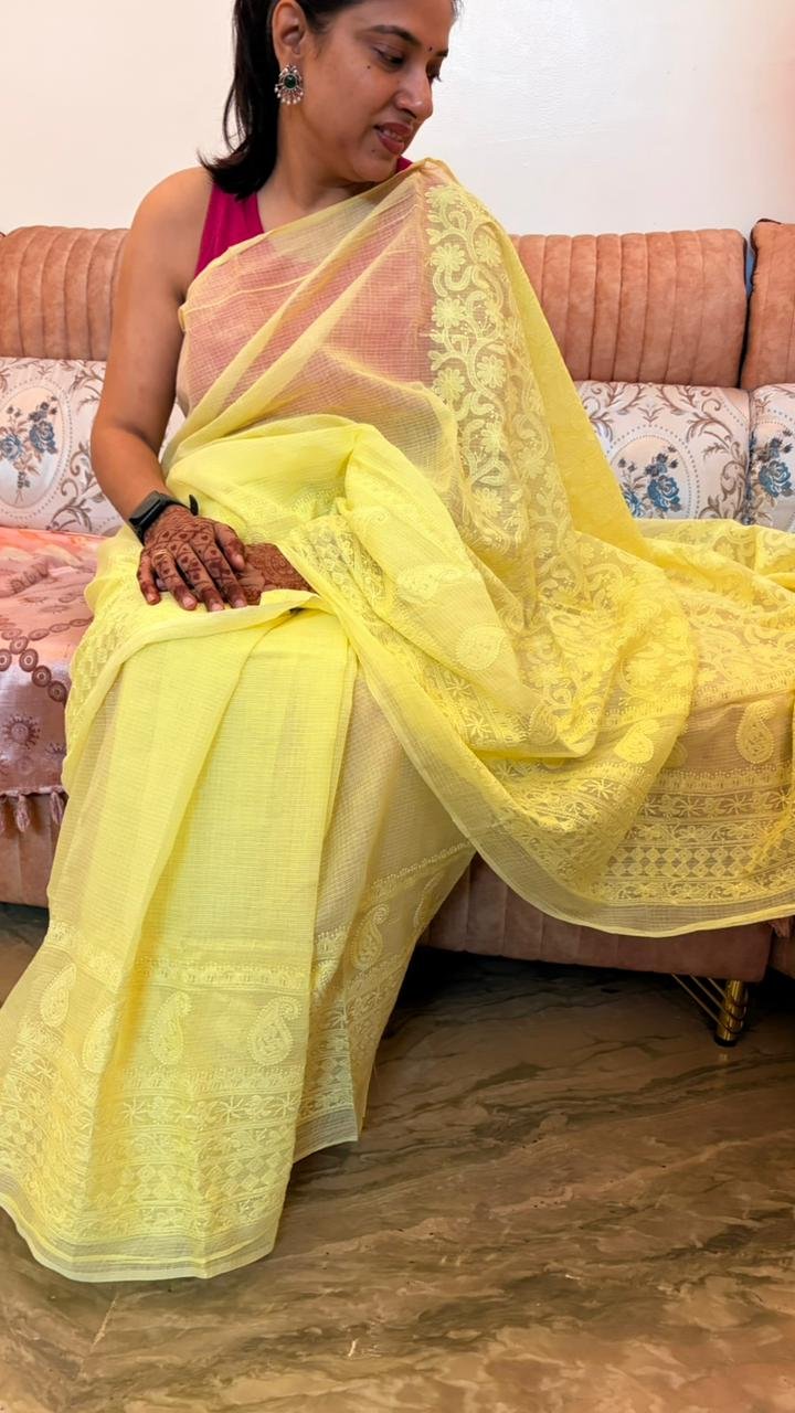 Yellow Kota Doria Saree with floral Parsi embroidery and white border