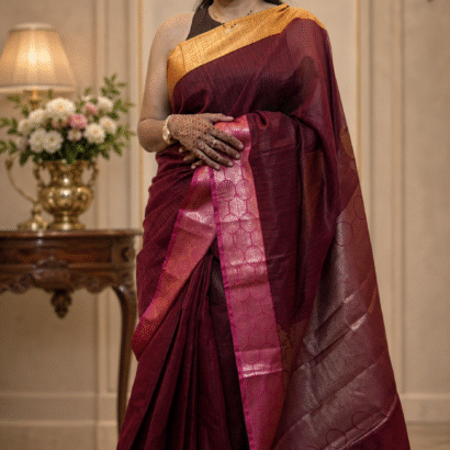 Deep maroon handloom silk saree with mustard gold blouse and zari border