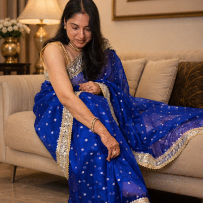 Royal blue Pure Banarasi silk saree featuring gold zari floral booti weaving and Sabyasachi-style mirror work lace border