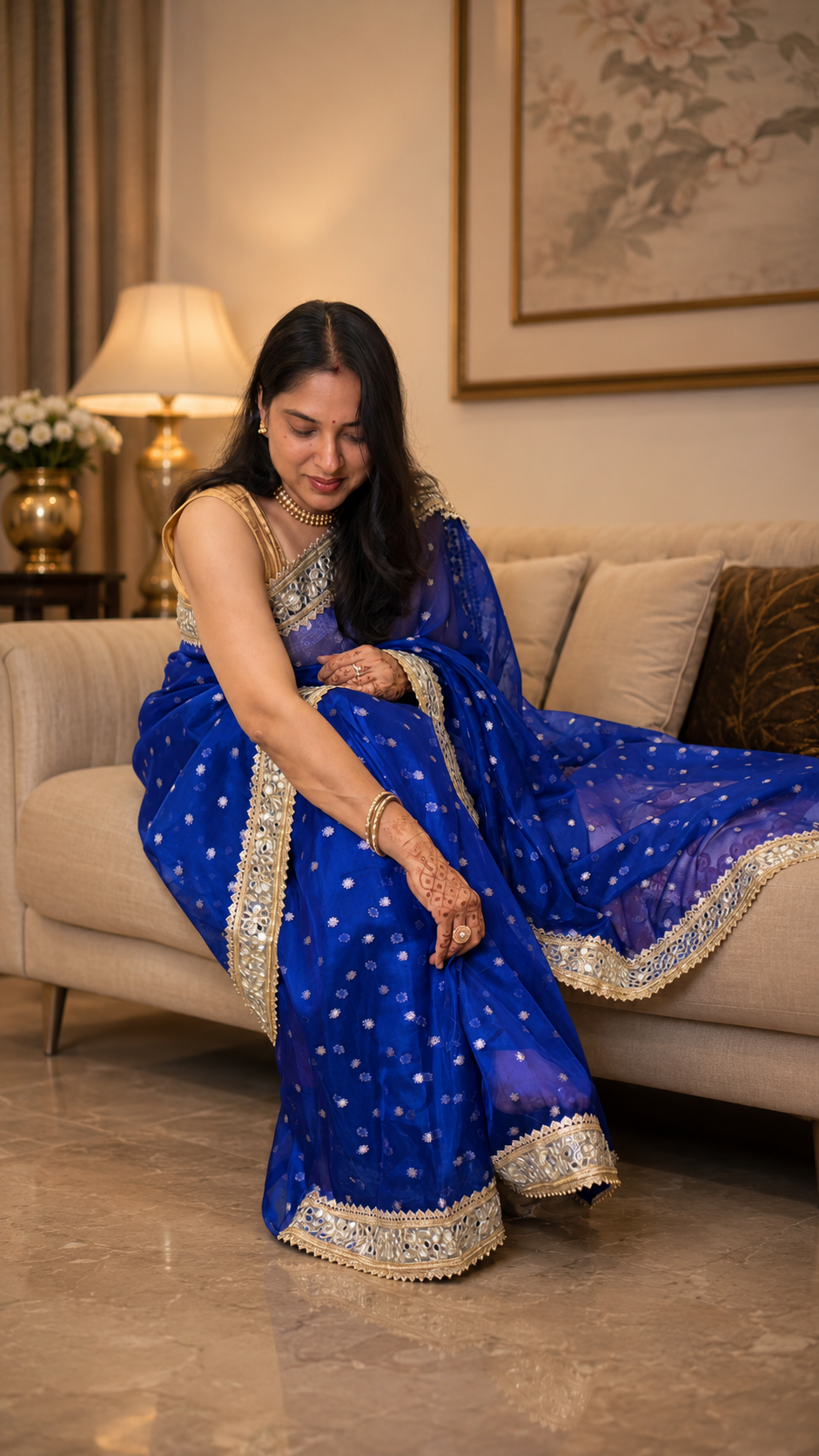 Royal blue Pure Banarasi silk saree featuring gold zari floral booti weaving and Sabyasachi-style mirror work lace border