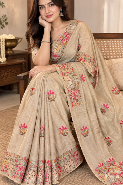 Elegant handloom tussar silk saree with paichwai embroidery, scalloped border and lotus-cow motifs
