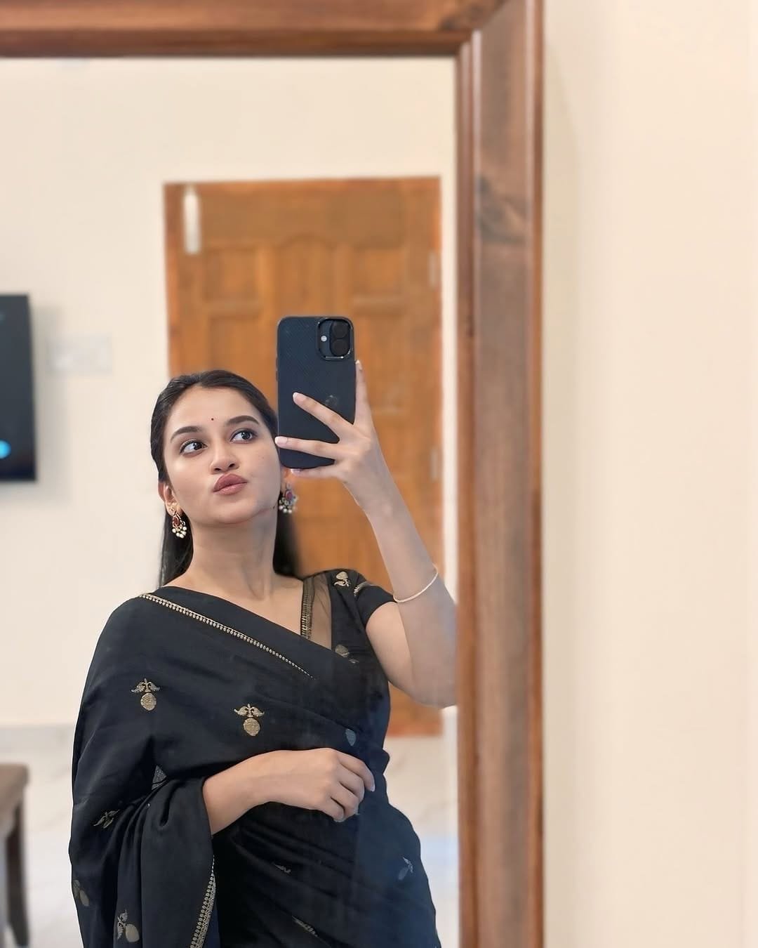 Black khadi silk saree with satin border and jacquard leaf design