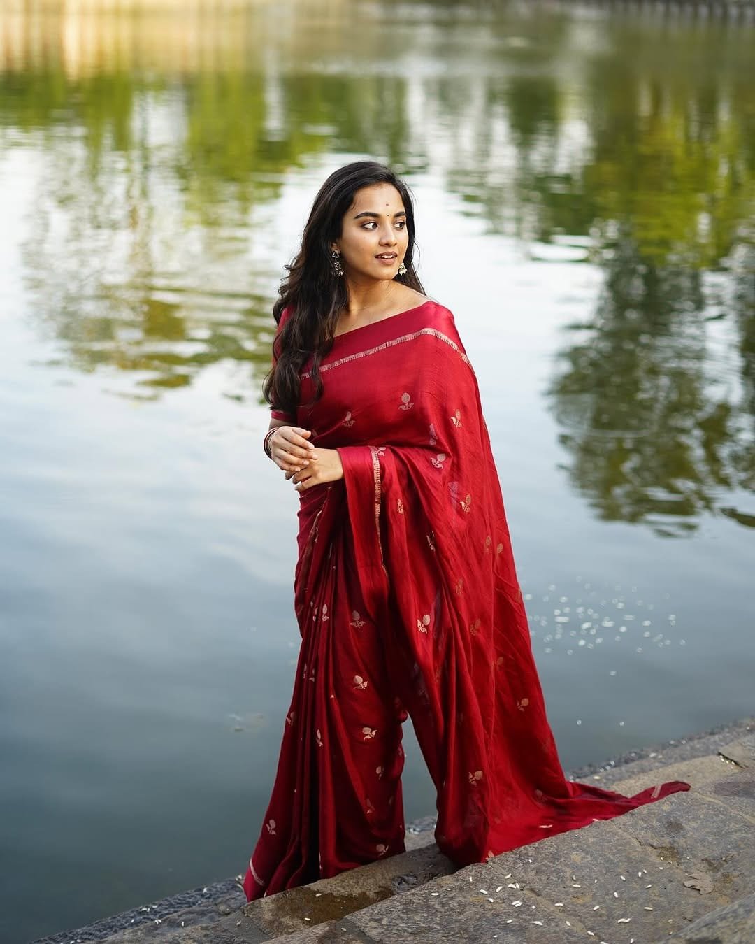 Red khadi silk saree with satin border and jacquard leaf design Red khadi silk saree with satin border and jacquard leaf design