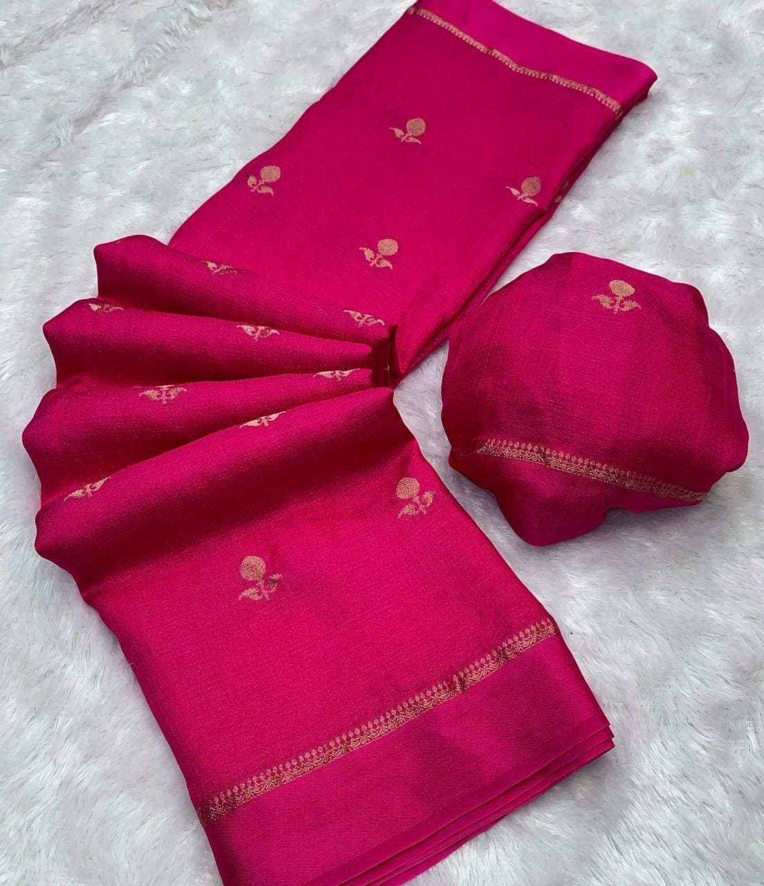 Rani pink khadi silk saree with satin border and jacquard leaf design