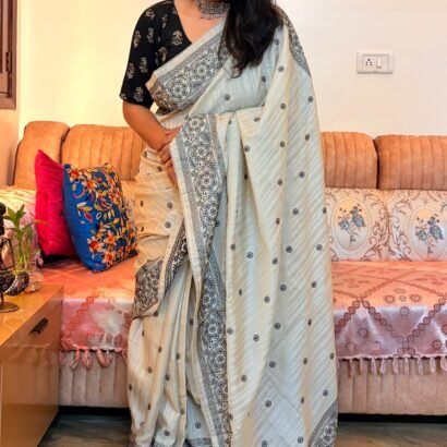 Pearl Pure Tussar silk saree with black embroidery, lace border and running blouse piece