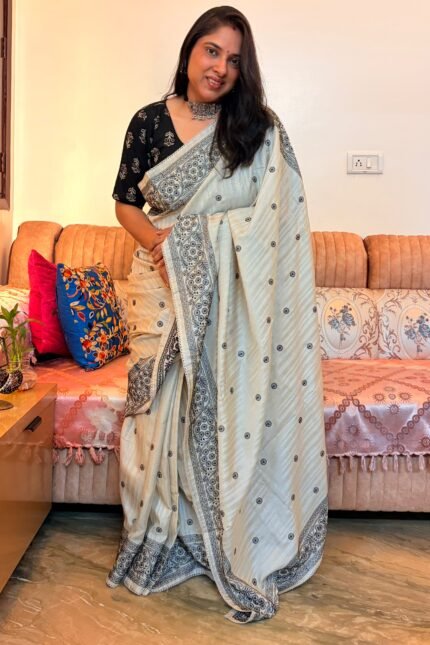 Pearl Pure Tussar silk saree with black embroidery, lace border and running blouse piece