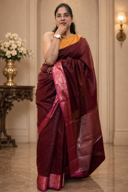 Deep maroon handloom silk saree with mustard gold blouse and zari border