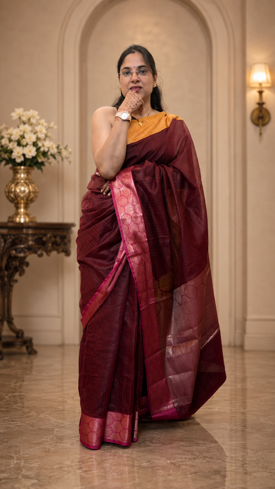 Deep maroon handloom silk saree with mustard gold blouse and zari border