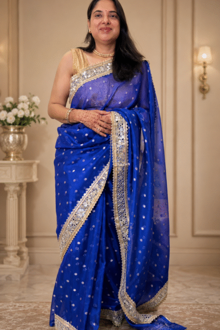 Royal blue Pure Banarasi silk saree featuring gold zari floral booti weaving and Sabyasachi-style mirror work lace border